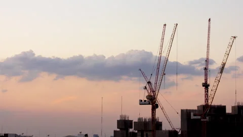 Time lapse of construction of tall building with a crane. 動画素材 269694565