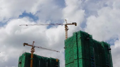 Time lapse of Construction tower cranes Video stock 12023160