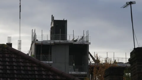 A time lapse of construction workers building a high rise building Stock Footage 256295242