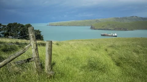 Time-lapse of container ship exiting Lyttelton Harbour, Canterbury, New Zealand. Stock Footage 134314417