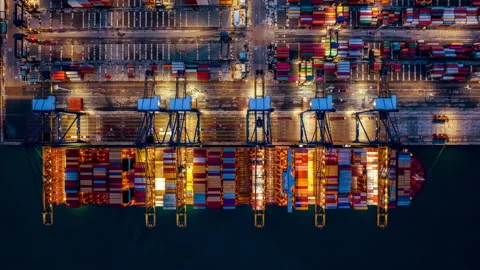 Time lapse of Container ship loading and unloading at night in port. Stock Footage 206120513