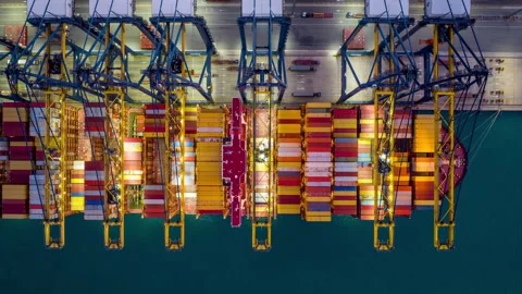 Time lapse of Container ship loading and unloading at night in port Stock Footage 220446488