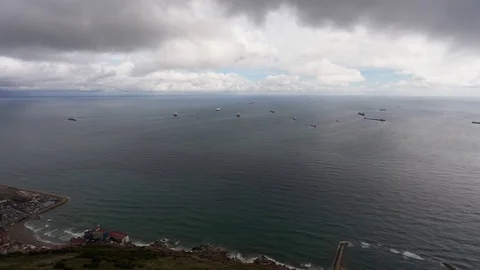 Time Lapse of Container Ships waiting off the shore of Gibraltar Stock Footage 77405989