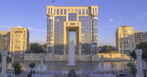 Time lapse of a contemporary building and a fountain in Montpellier, France Stock Footage 70793714