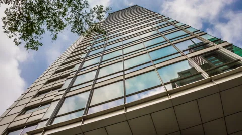 Time Lapse of a Corporate Building &amp; fast moving clouds in Amsterdam Stock-Footage 68015254