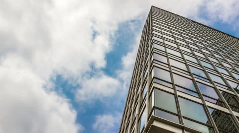 Time Lapse of Corporate Building &amp; fast moving clouds in Amsterdam Stock-Footage 68015431