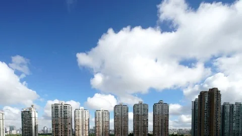 Time lapse: Could flying fast over Shanghai apartment building Stock Footage 80010688