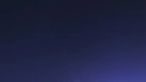Time-lapse. Countless starry night sky moving over the horizon in Fukuoka Vídeos de archivo 335111557
