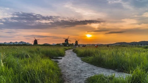 Time Lapse country landscape with the windmill at sunrise South Korea Stock Footage 114602829