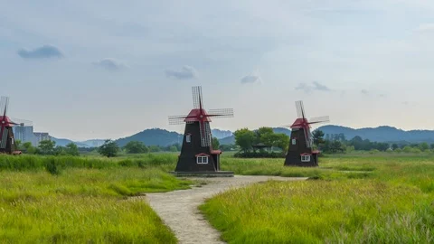 Time Lapse country landscape with the windmill at sunrise South Korea Stock Footage 114603448