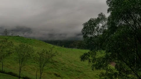 Time Lapse of Countryside Mist forming and connecting with low cloud Stock Footage 60735970