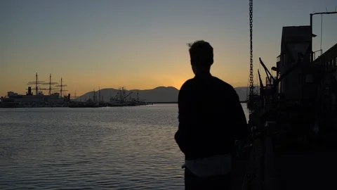 Time lapse of A couple in love embracing while watching a sunset in San Francisc Stock Footage 89561153