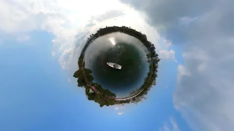 Time-lapse of couple rowing the boat on the lake. 360-degree, little planet, pla Stock Footage 166520122