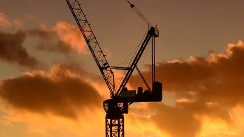 Time lapse crane on building site in leeds at sunset yorkshire uk Stock Footage 97624252