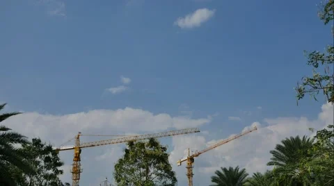 Time lapse crane working in construction site and clouds moving in sky, Stock Footage 59826569