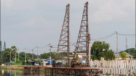 Time lapse crane is working in pile foundation work. Stock Footage 117377784