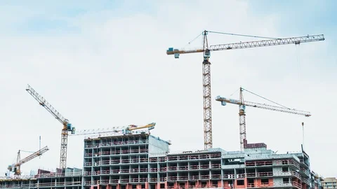 Time lapse cranes and builders are working on the construction site Stock Footage 89045255