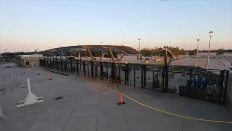 Time-lapse of cranes functioning outside stadium Stock Footage 105422921