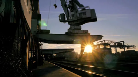 Time lapse. cranes industrial industry. sunset dusk sun flare Stock-Footage 33803705
