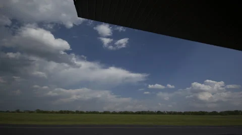 Time Lapse -  Crazy Clouds at a Air Field Stock Footage 39564343