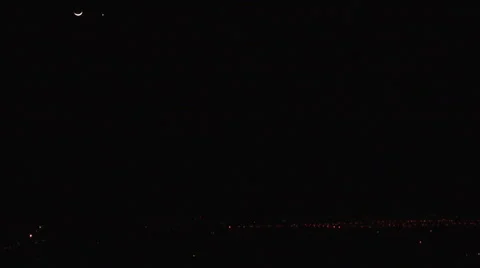 Time Lapse of Crescent Moon and Venus Setting Stock Footage 54730686