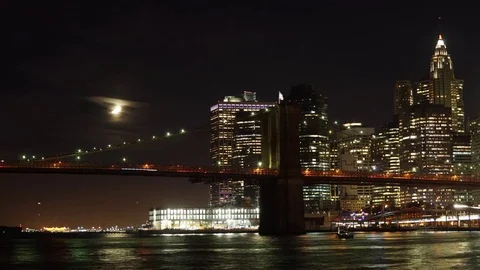 Time-Lapse of the Crescent Moon Seting by the Brooklyn Bridge and Manhattan Stock Footage 69715293