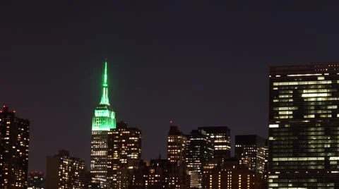 Time-lapse of the crescent moon setting in Manhattan with pan Stock Footage 63635643