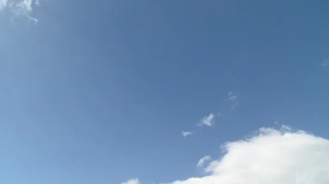 Time Lapse crisp white clouds in blue sky Stock Footage 37566414