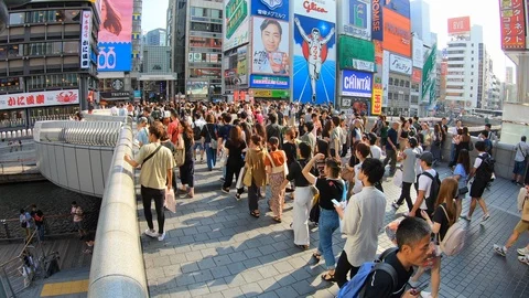 Time lapse of crowd in Dotonbori, Osaka, Japan in Asia with Glico sign Stock Footage 116138673