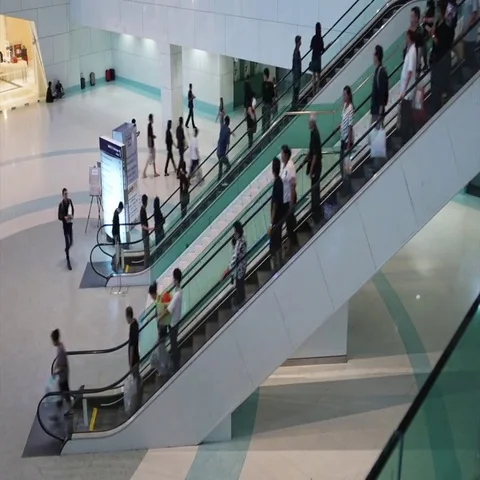 Time lapse of Crowd On Escalator in shopping mall. Stock Footage 69526971