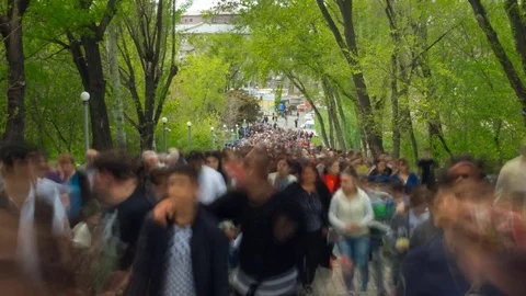 Time lapse of crowd of people walking at you with blurred images on the Stock Footage