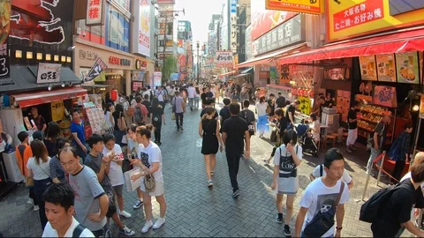 Time lapse of crowd, stores and neon in shopping area of Osaka, Japan in Asia 스톡 동영상 116137147