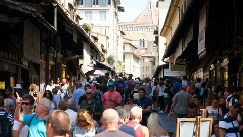 Time lapse. Crowd of tourists visiting Ponte Vecchio Bridge. Florence, Italy. Video stock 94743311