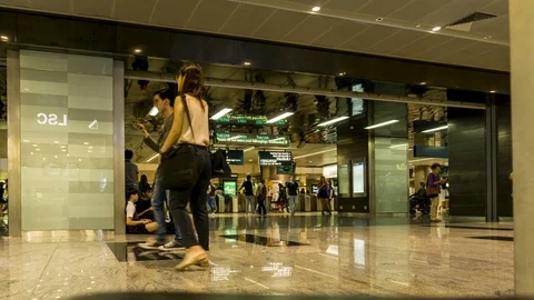 Time-lapse of crowded people in and out  MRT Station at Singapore. Stock Footage 100324308