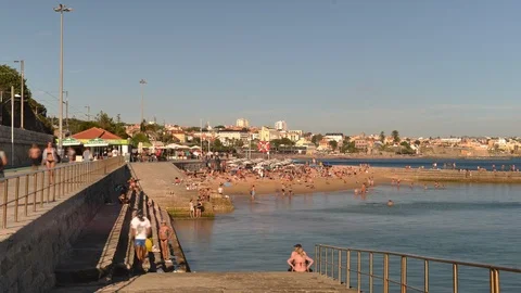 Time lapse of crowded sandy beach in Cascais near Lisbon, Portugal Stock Footage 93649074