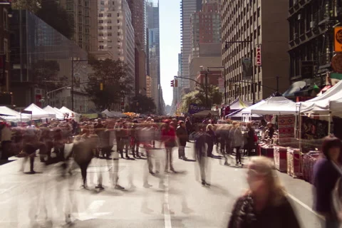 Time lapse of crowds Eighth Avenue Fall Festival, a New York City street market Stock Footage 52884431