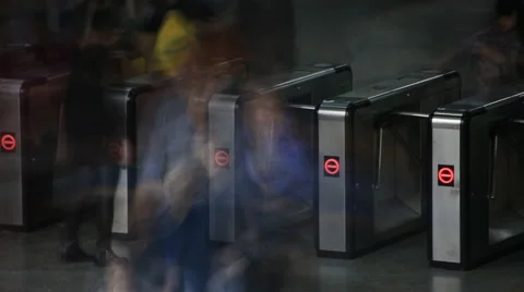 Time lapse of Crowds of people scanning subway pass and passing through ticket g Stock Footage 56802614