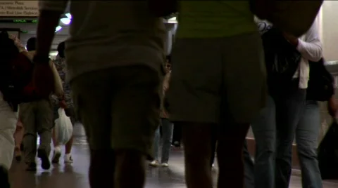 Time-lapse of crowds walking in an underground train station Stock Footage