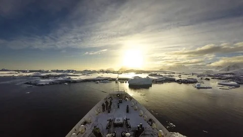 Time lapse of a cruise ship heading to Lemaire Channel, Antarctica Stock Footage 83413198