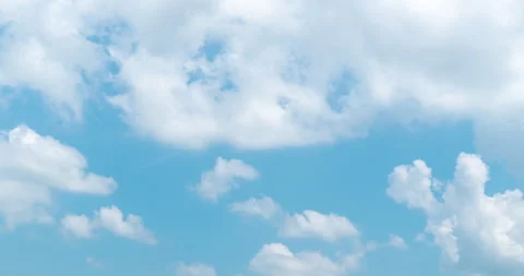 Time lapse of cumulus clouds with bright blue sky	 Stock Footage 134310318