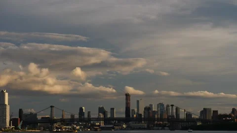 Time-lapse of the cumulus clouds passing over the Williamsburg Bridge, NYC Stock Footage 159922157