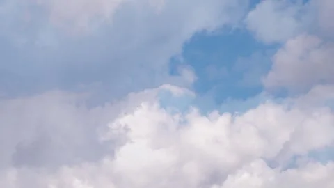 Time lapse of cumulus clouds on turquoise sky shot close up Stock Footage 265738890