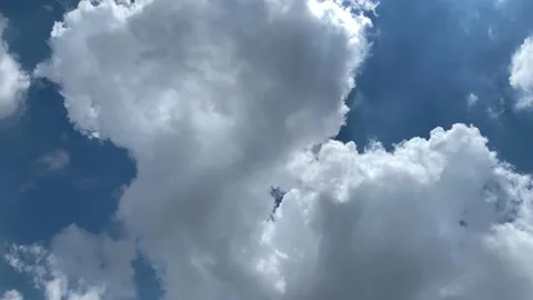 Time lapse cumulus floating upward motion Stock Footage 131417725