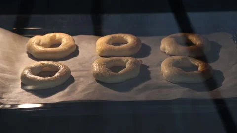 Time-lapse. custard cakes or eclairs baking process in the oven Stock Footage 150099659
