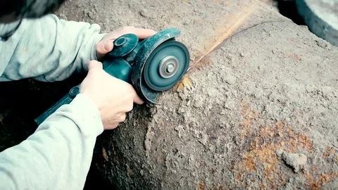 Time lapse of cutting big old rusted iron pipe Stock Footage 73852726