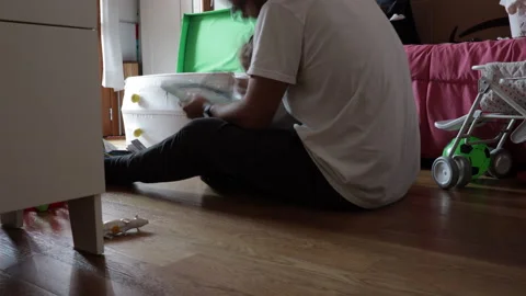 Time lapse: Dad plays with his daughterin her room Stock Footage 142358027