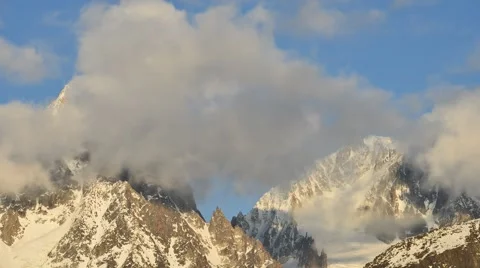 Time lapse / Dance of Clouds over the Alps Stock Footage 61819617