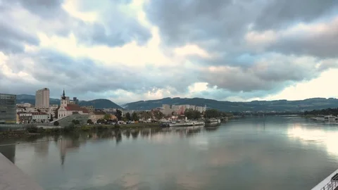 Time lapse of the Danube River in Linz, Austria on a cloudy Fall day Stock Footage 70792939