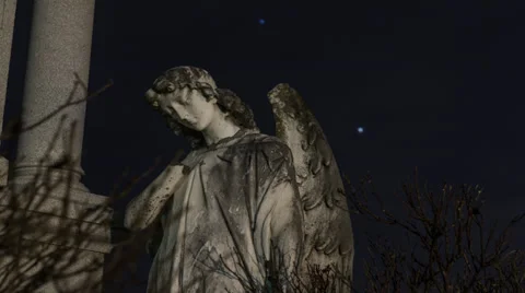 Time Lapse - Dark Angel Graveyard Night Stock Footage 39544295