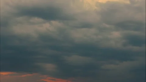 Time lapse dark blue clouds move across the stormy sky Stock Footage 199008703
